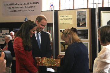 FF1-108 Kilt presented to Royal couple by Marion Foster